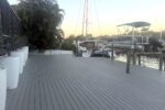 Private dock with boat lift on the canal at sunset — Canal Villa