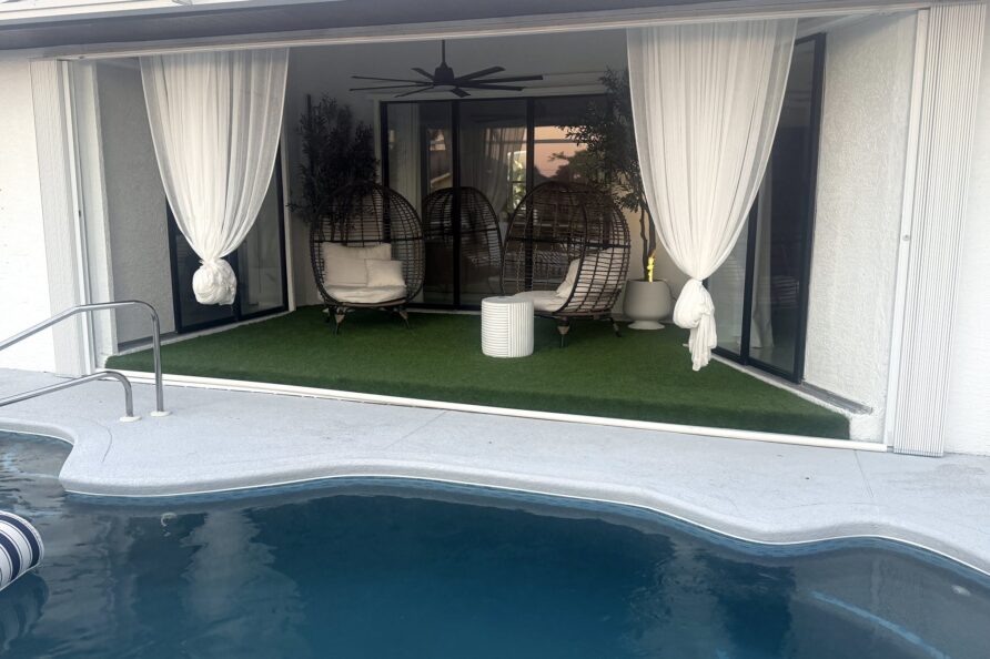 Lanai egg chairs by the pool — Canal Villa