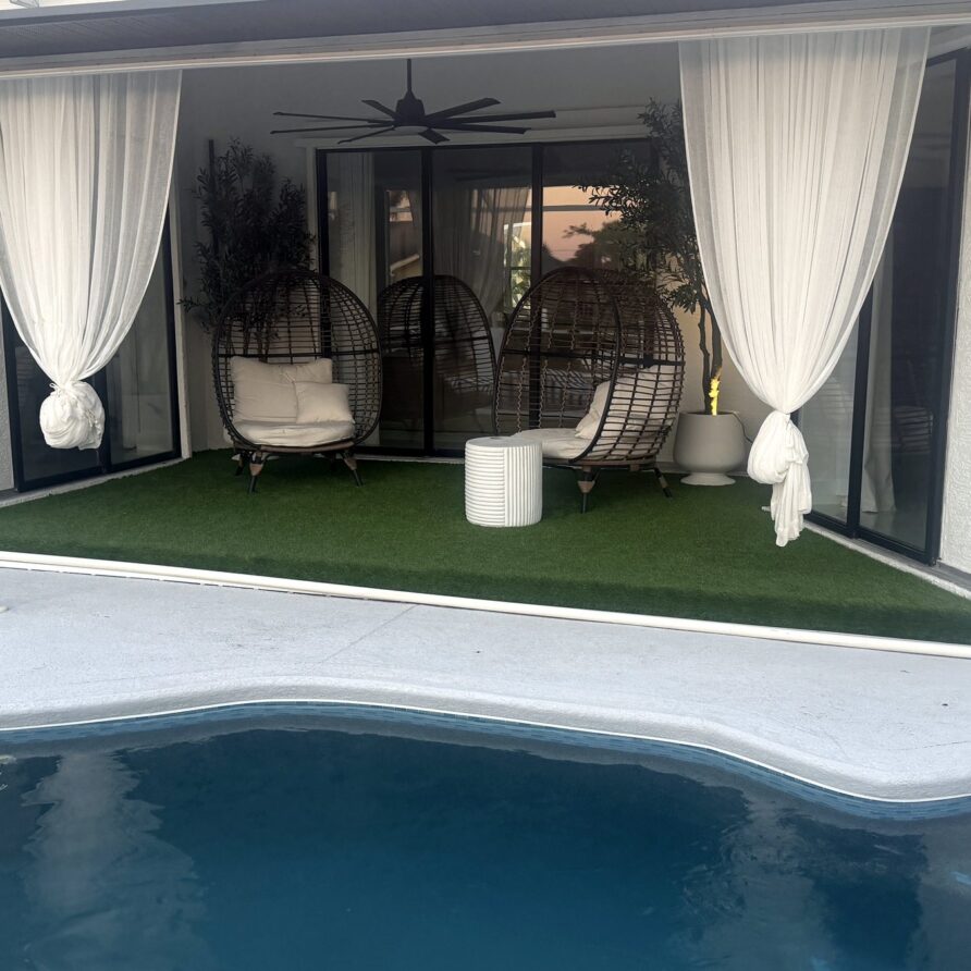 Lanai egg chairs by the pool — Canal Villa