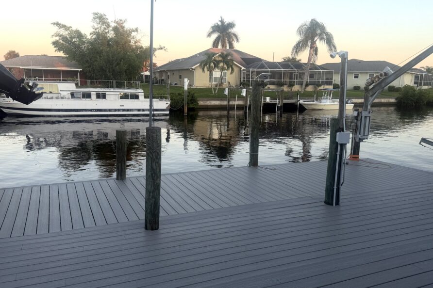 Composite dock and canal at sunset — Canal Villa