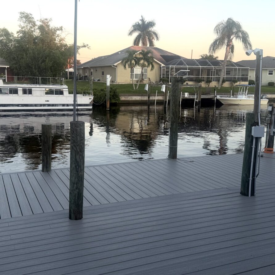 Composite dock and canal at sunset — Canal Villa
