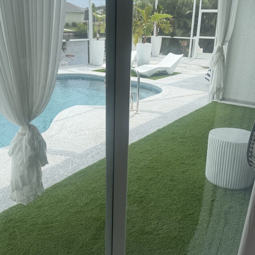 Heated screened pool with sun loungers and private dock
